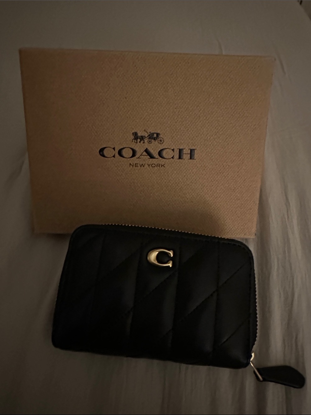 Coach Black Quilted Leather Zip-Around Wallet with Gold 'C'